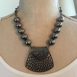 Bold chrome tone large pendant beaded necklace